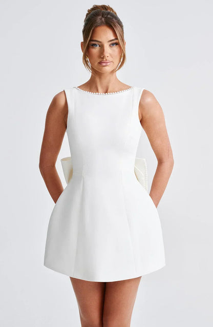 Women's Short Dress | Pearl Trim Neckline & Statement Back Bow Detail